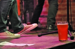 Feature image of beer pint on stage at Cherry Bar during Good Beer Week