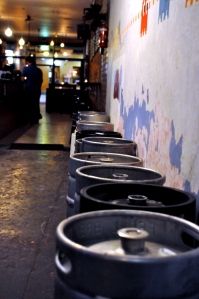 Kegs lining a wall at The Alehouse